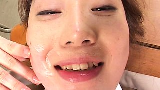 Pigtailed Japanese teen expresses her love for hot semen