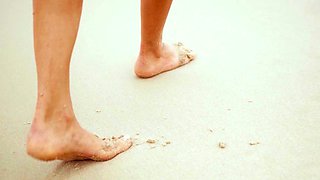 Petite Australian MILF strips at a beach