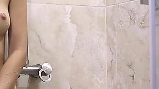 Skinny Teen Satisfies Herself in Shower
