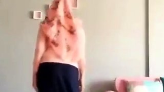 Turkish Arab in Hijab and Turban Performs a Striptease