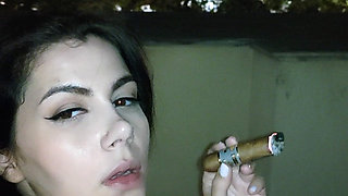 Smoking a Cigar Naked Outside at Night