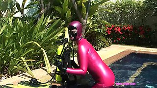 Pink latex scuba doll