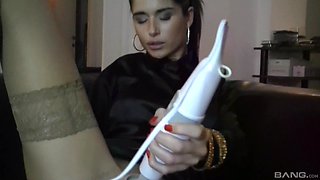 Solo beauty uses huge vibrator on pussy and over the clit