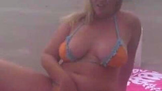 Wife masturbates on beach