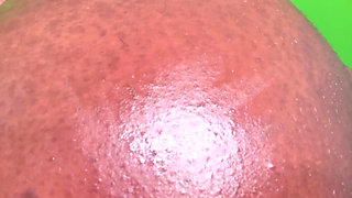 Ebony Oiled up Ass and Gives Self Spankings