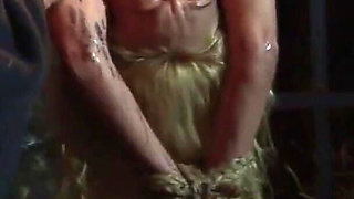 Witch Hangs Upside Down and Gets Drizzled with Black Wax