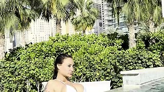 Sexy Monika Fox In A White Bikini Swims In A Pool