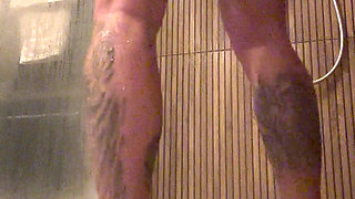 Horny showering with cumshot