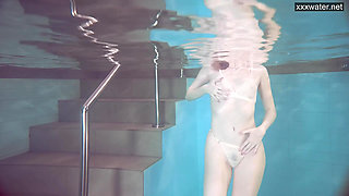 Sasha Vetochka goes naked into the pool