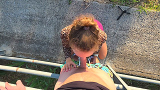 Risky public blowjob and cumming on tits by the roadside.
