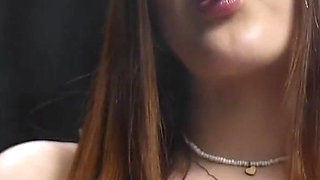 Sweet Russian Redhead Smoking in Sheer Corset