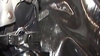 Dominatrix Trains Hooded Slave with Huge Dildo