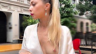 Flashing boobs in public. Topless right in the middle of a