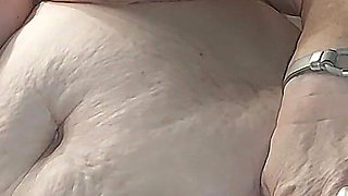 Busty Granny Fingers Wet Pussy in Feathered Heels