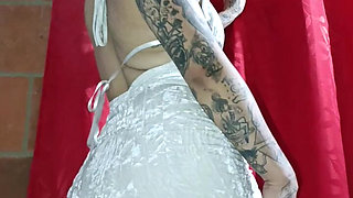 Tattooed Latin Woman, Black Heels Plays Modeling