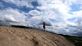 Nude Blonde Babe at a Deserted Beach and Construction Site