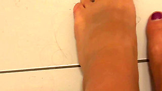 Footplay with Golden Shower