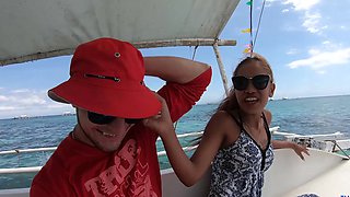 Asian amateurs on a Thai yacht, naturals out in the sun