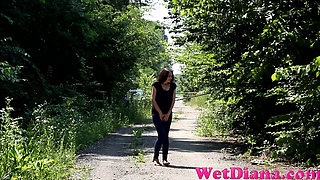Wide open legs peeing outdoor and Desperate to pee, she has to pee in front of the car in her jeans