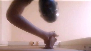 High-Heeled Milf Sucks and Fucks in a Catsuit at a Gloryhole