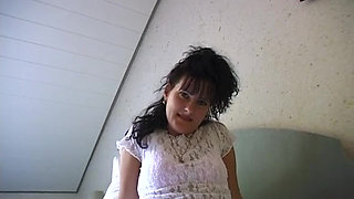 Horny girl lays in bed finger fucking herself and stroking clit