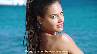 Two beautiful latinas enjoy passionate sex on the beach with intensity.