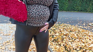 Naughty Granny Tongue Out Flashing Big Tits in Public