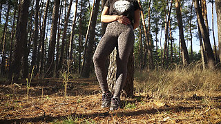 Girl Teases Her Big Cameltoe in Leopard Leggings Outdoors