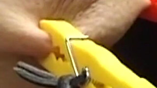 Hooded Mature Man Endures Clamps and Heavy Chains