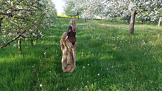 Mature Woman Is Walking Around Outside in a See-through Bodysuit!
