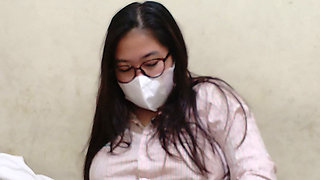 A beautiful female college student is on school break.