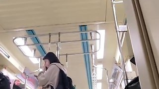 Japanese Teen's Amateur Charm Unveiled in Sultry Upskirt Tease