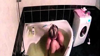 Peeking at stepdaughter Amy shaving in the bath