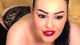 Cock Hungry Whore on Cam Sucks Dildo Fast with Red Lipstick