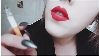 Mistress With Luscious Red Lips Close-up Smoking Cigarette