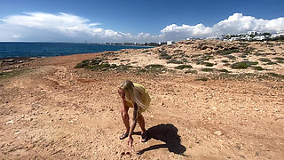Blonde Teen Pees Twice by the Sea!
