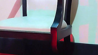 Giant Woman Keeps Her Lover Under Her Feet While She Sits Cross-legged