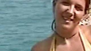 Horny Redhead Babe Fingers Pussy on Wild Beach