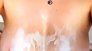 Brunette seductress working her big boobs and hot ass