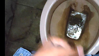 Masturbating in toilet and big cumshot