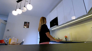 Sexy hot blonde girl in pajama shorts in the kitchen wants to flash her pussy no panties under her pyjama
