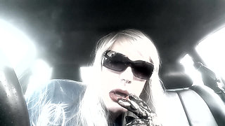 Mrs. Ruthie Dommie Mommy smoking Marlboro 100s in her car