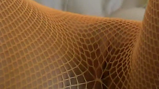 Blonde in Orange Fishnets - Glass Toy on the Purple Bed