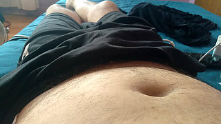 young boy massages his dirty penis