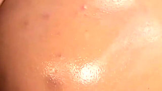 Oiled Babe with Nice Round Ass Is Bouncing on Her BF's Hard Cock