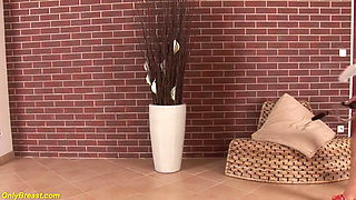 Hot sporty milf plays with her oiled boobs