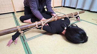 Xr40-a Girl in Black Stocking Is Tied to a Cross