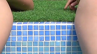 Two Lesbians Have Fun in Outdoor Pool with Happy Ending for Both!