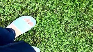 Brunette with foot fetish rubs big dick with her feet in POV