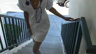 Hot black nurse gets her pussy slammed on the table